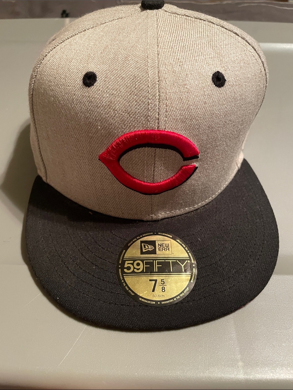 New Era Gray and Black Fitted Cap with Red Emblem